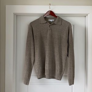 Long sleeve button up sweater.